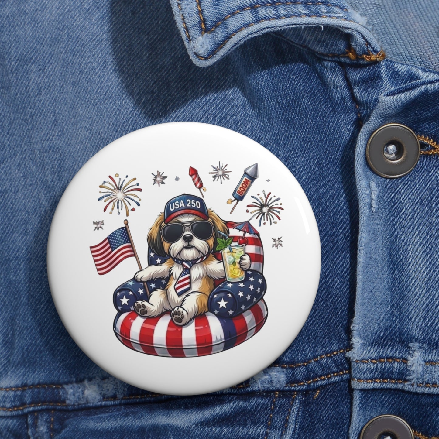 Button with a dog wearing sunglasses and an 'USA 250' hat on a denim jacket.