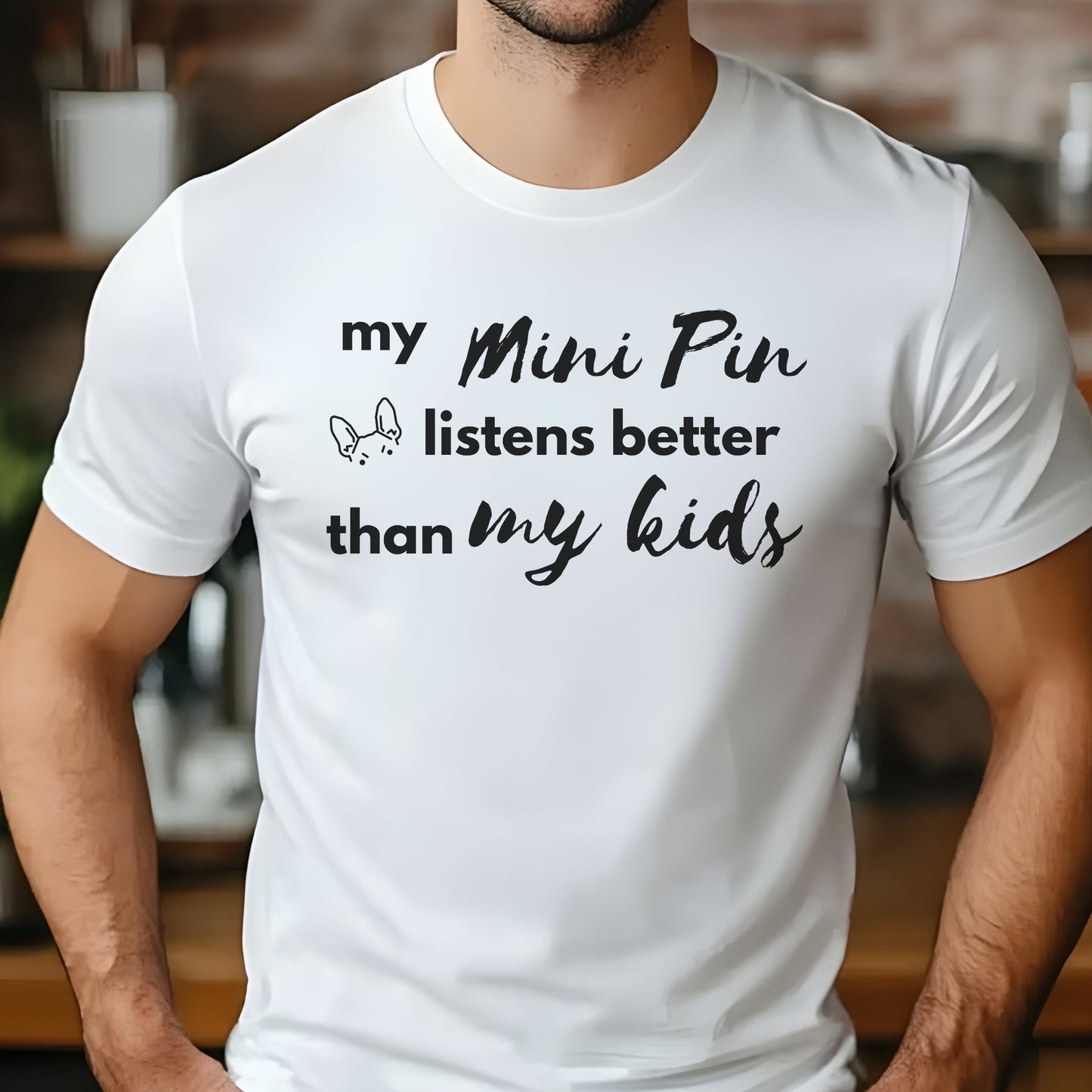 White unisex t-shirt with white text: "my Mini Pin listens better than my kids" and a small Miniature Pinscher face illustration