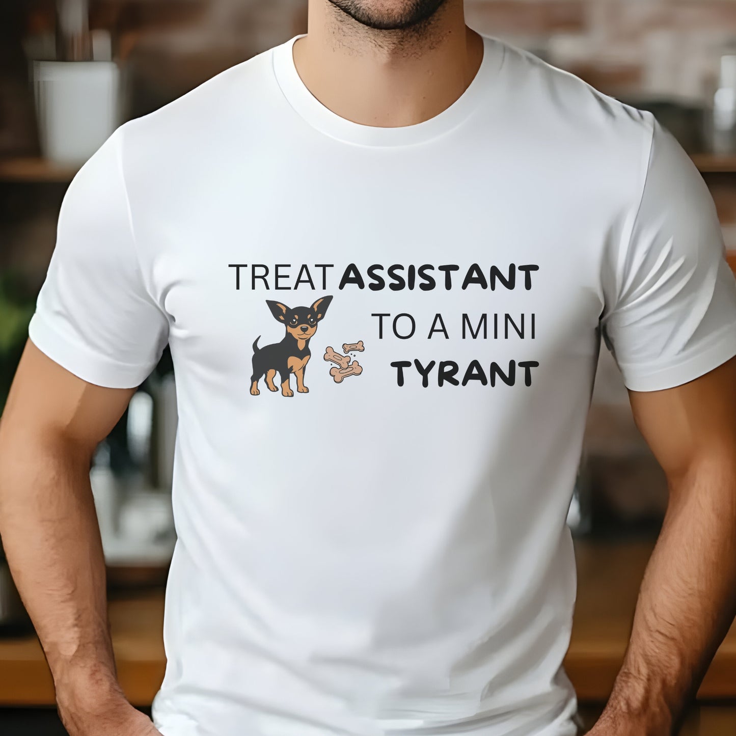 White unisex t-shirt with Miniature Pinscher illustration and text: "Treat Assistant to a Mini Tyrant"