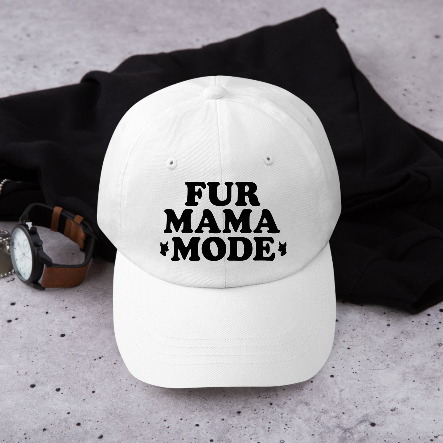 White "Fur Mama Mode" Miniature Pinscher cap on a wooden table at the beach, perfect for dog moms and Min Pin lovers
