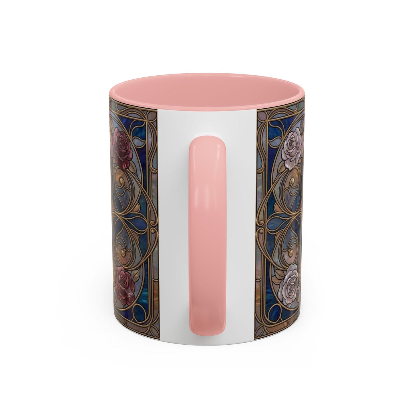 A ceramic mug with a white body, a pink handle and interior, and a detailed Art Nouveau floral pattern in blue, gold, and pink on the sides, shown on a plain white background.