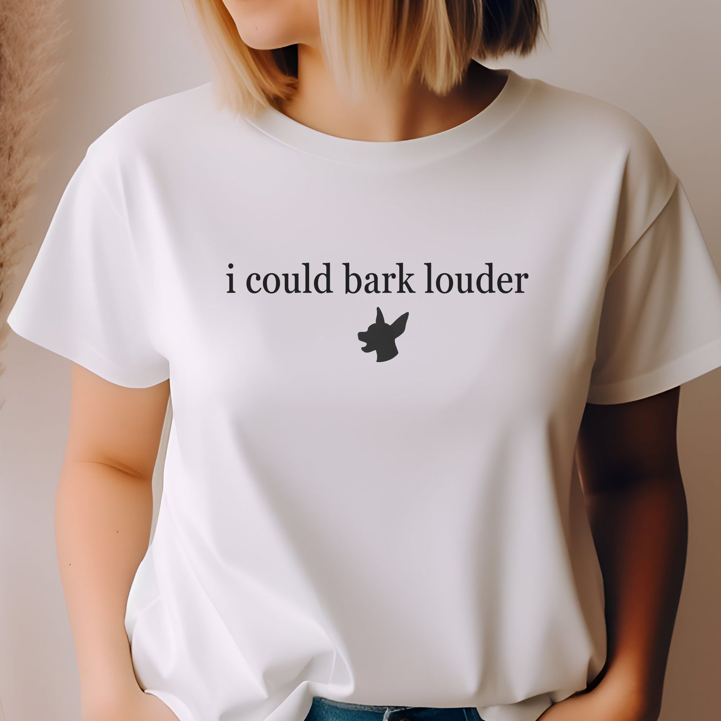 Woman wearing a navy blue "i could bark louder" Miniature Pinscher unisex t-shirt