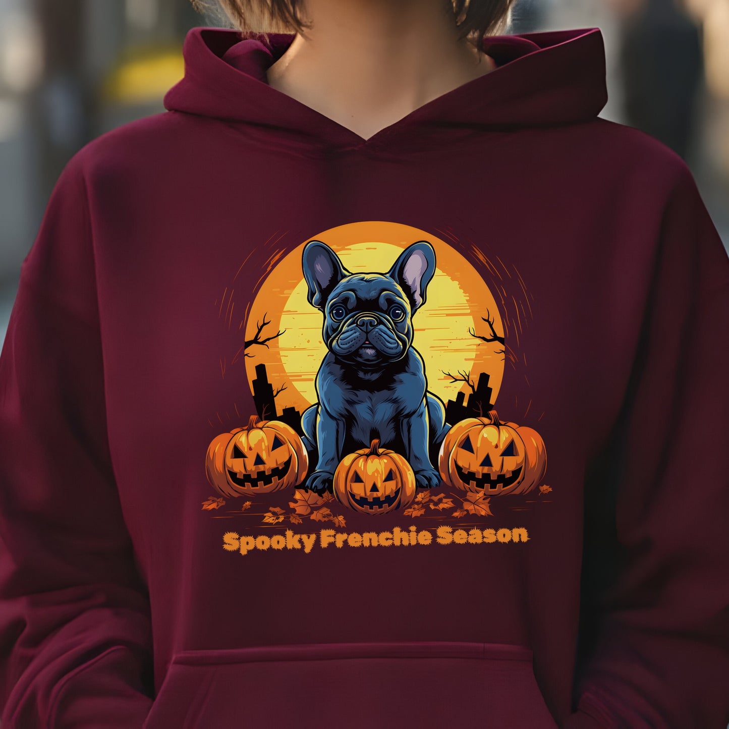 Maroon Halloween hoodie with French Bulldog, pumpkins, and graveyard, with "Spooky Frenchie Season" text