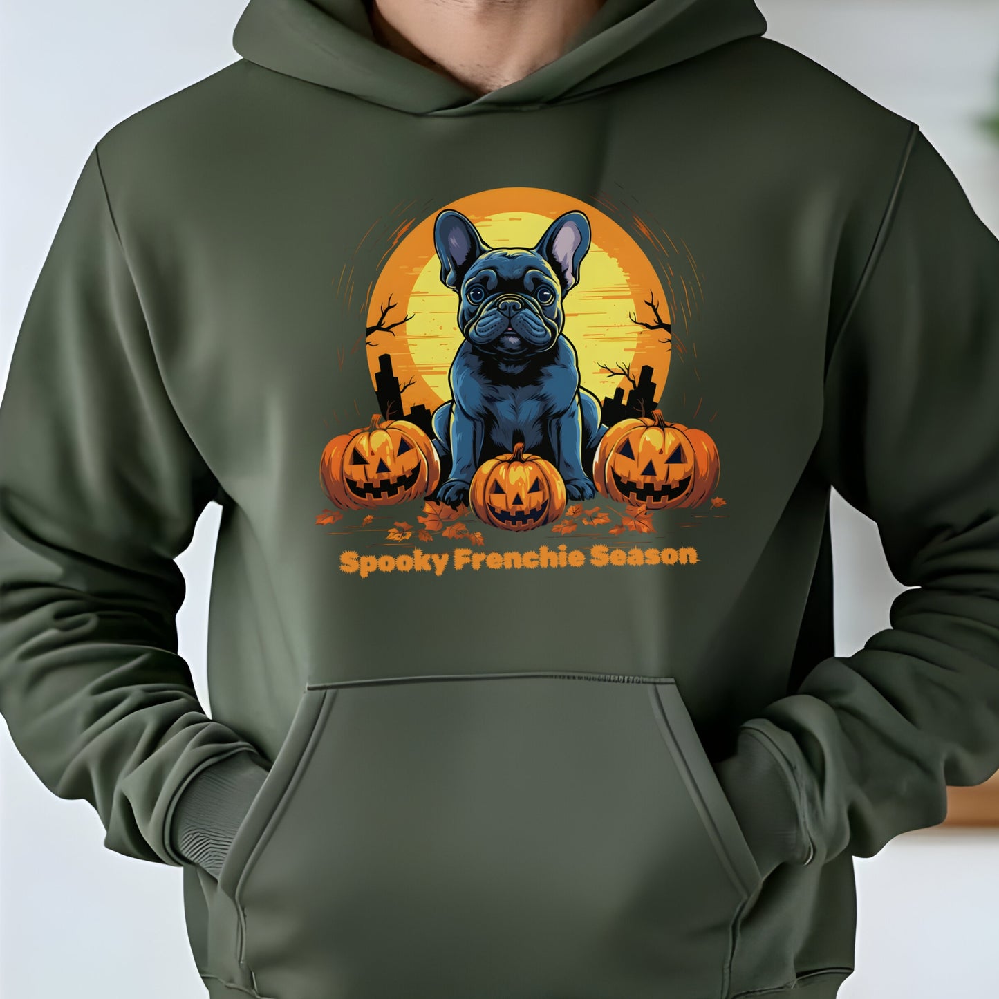 Military Green Halloween hoodie with French Bulldog, pumpkins, and graveyard, with "Spooky Frenchie Season" text