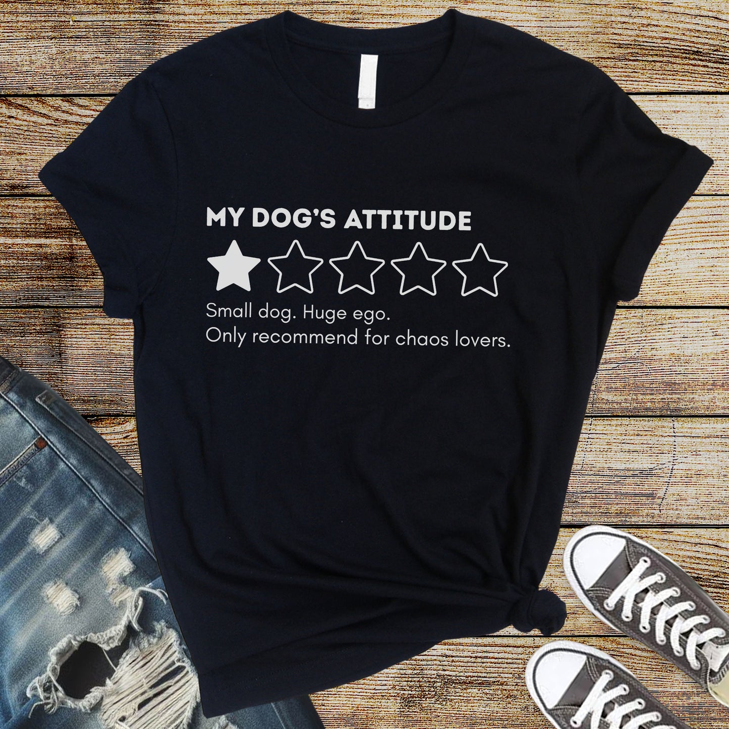 Black flat lay t-shirt with “My Dog’s Attitude” 1-star review, funny quote about small dog with huge ego for chaos-loving pet owners