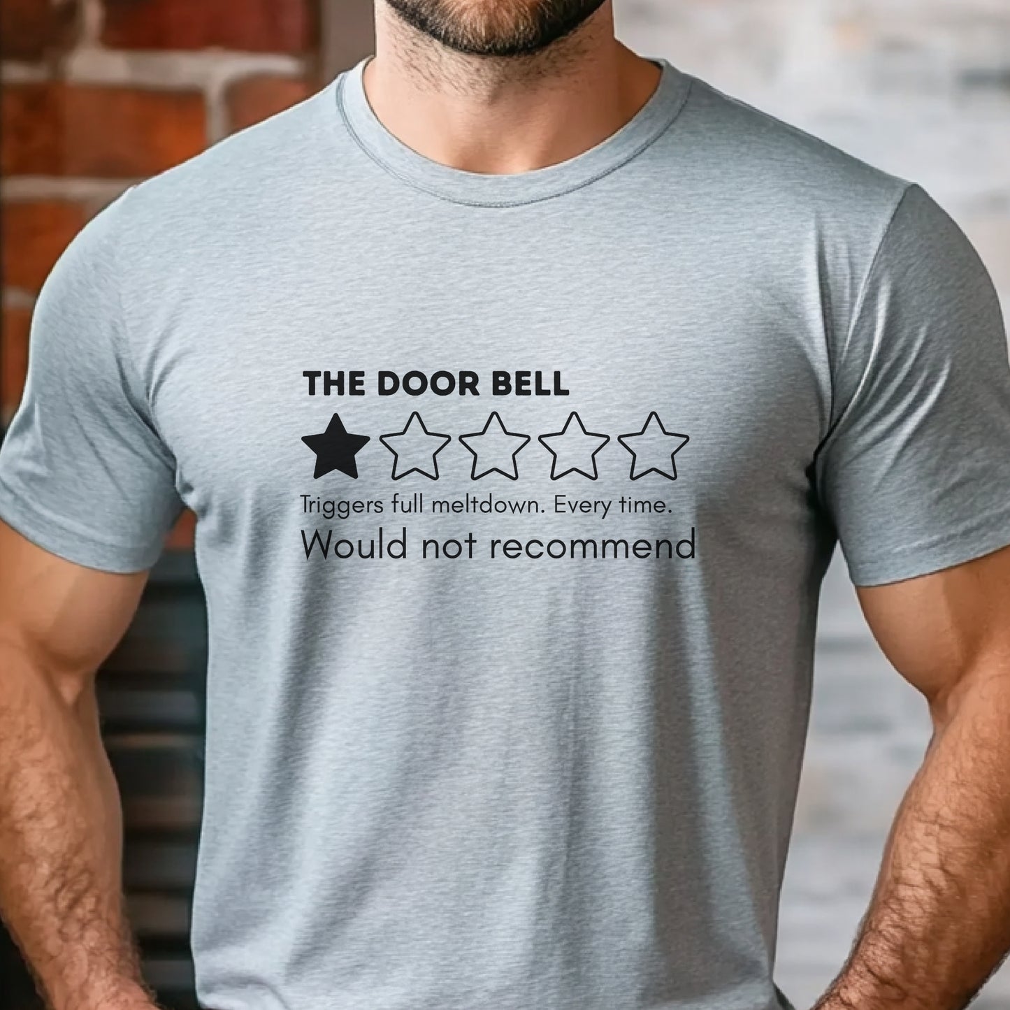 Grey t-shirt with “The Door Bell” text, 1-star review graphic, and “Would not recommend” meltdown humor design
