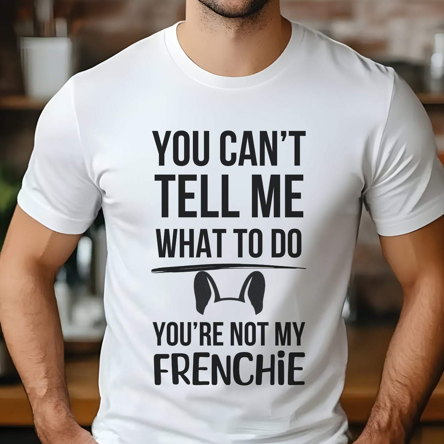 White t-shirt with white text reading “You can’t tell me what to do, you’re not my Frenchie” and a cartoon French Bulldog head outline.