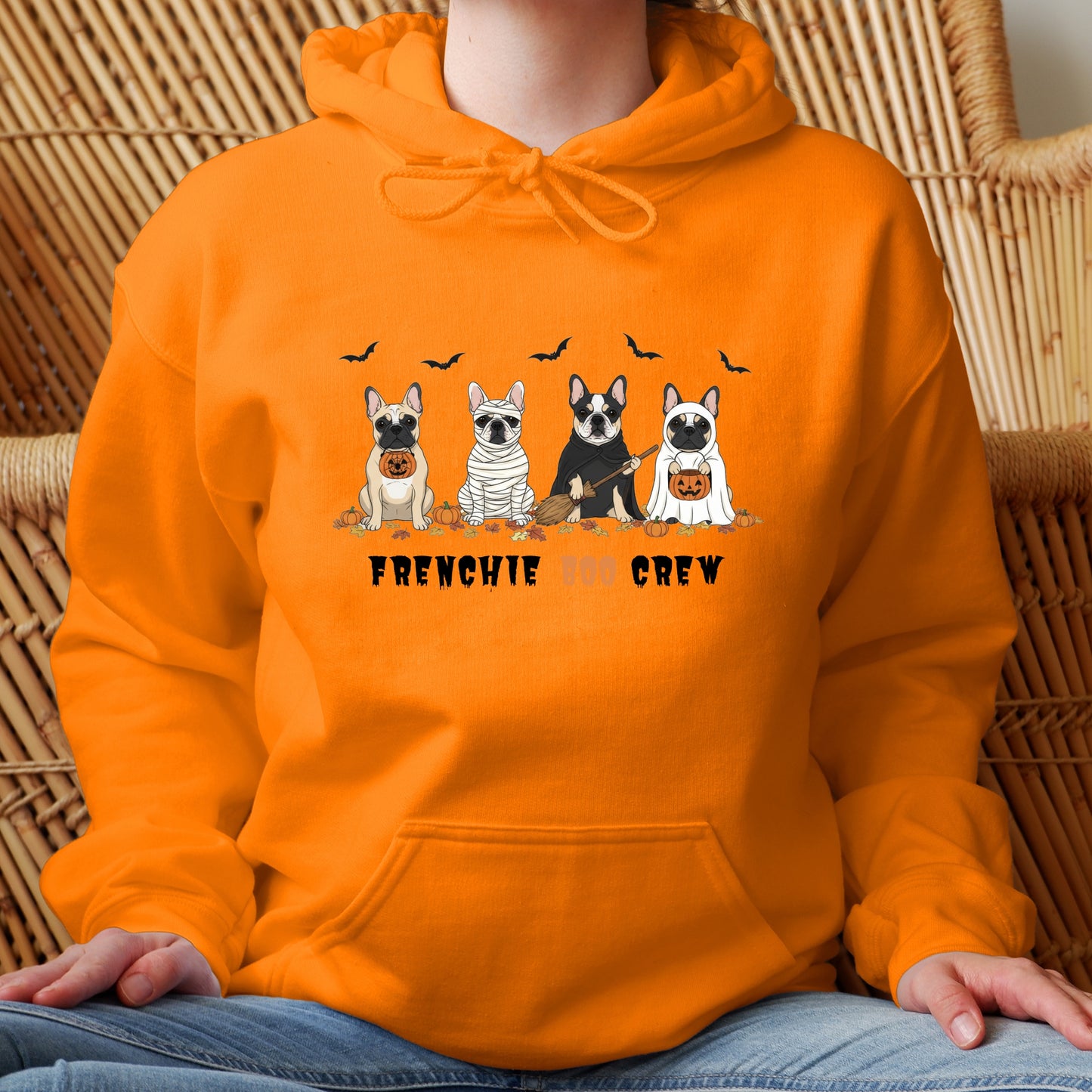 Halloween hoodie with four cartoon French Bulldogs in costumes, bats and pumpkins, and “Frenchie Boo Crew” text on white fabric.
