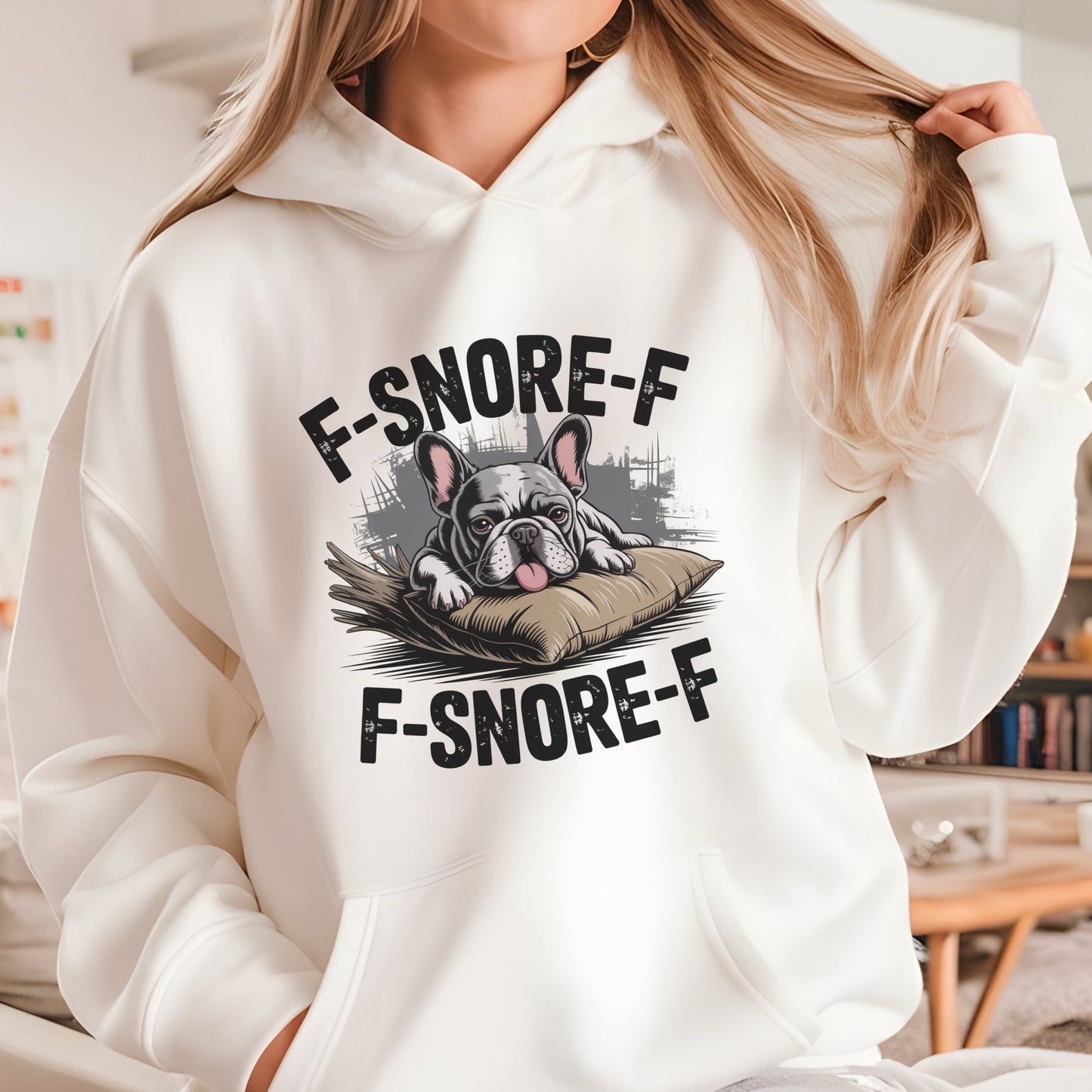Cartoon French Bulldog sleeping with “F-SNORE-F” text on a beige hoodie