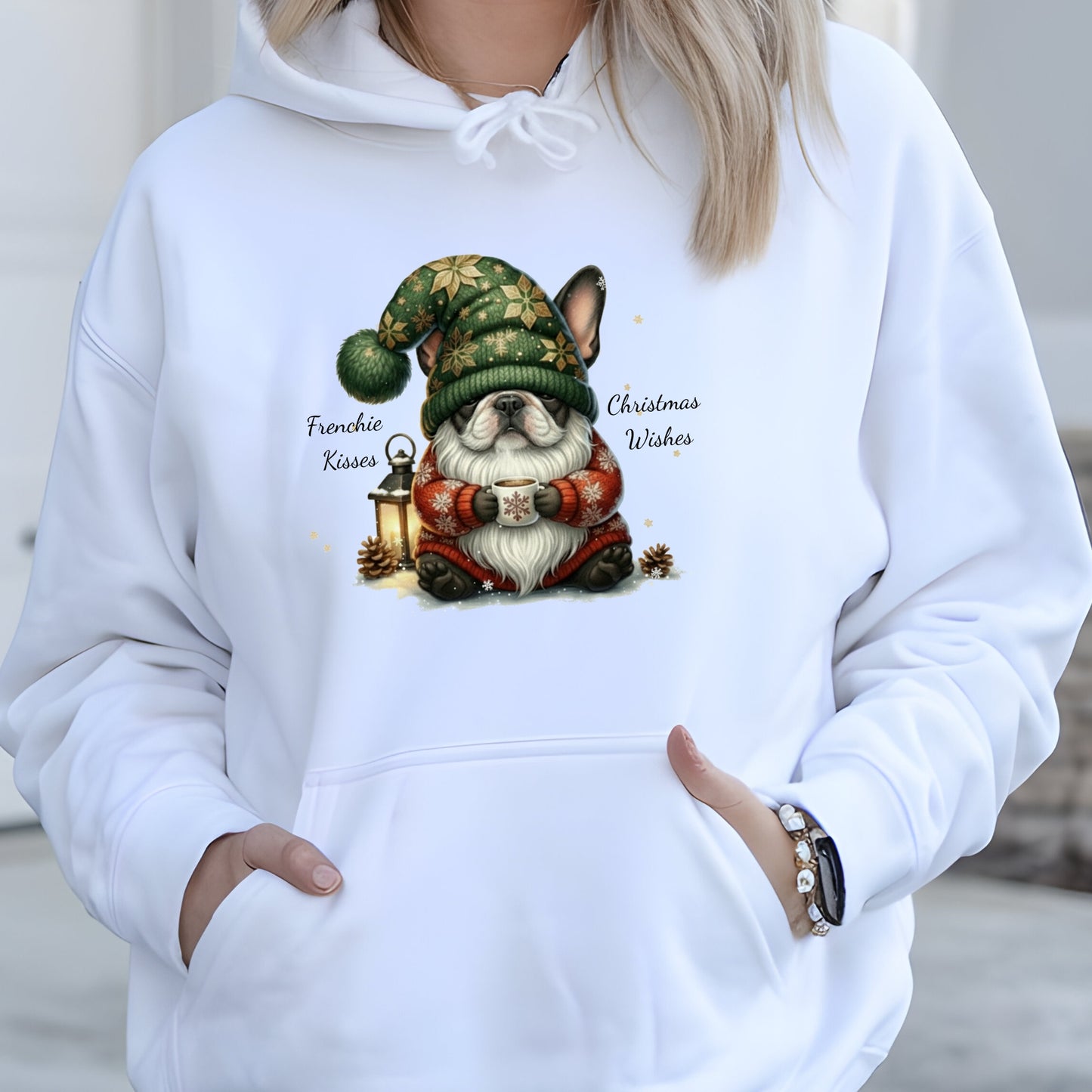 White hoodie with adorable French Bulldog dressed as a Christmas gnome, holding a lantern in festive holiday attire