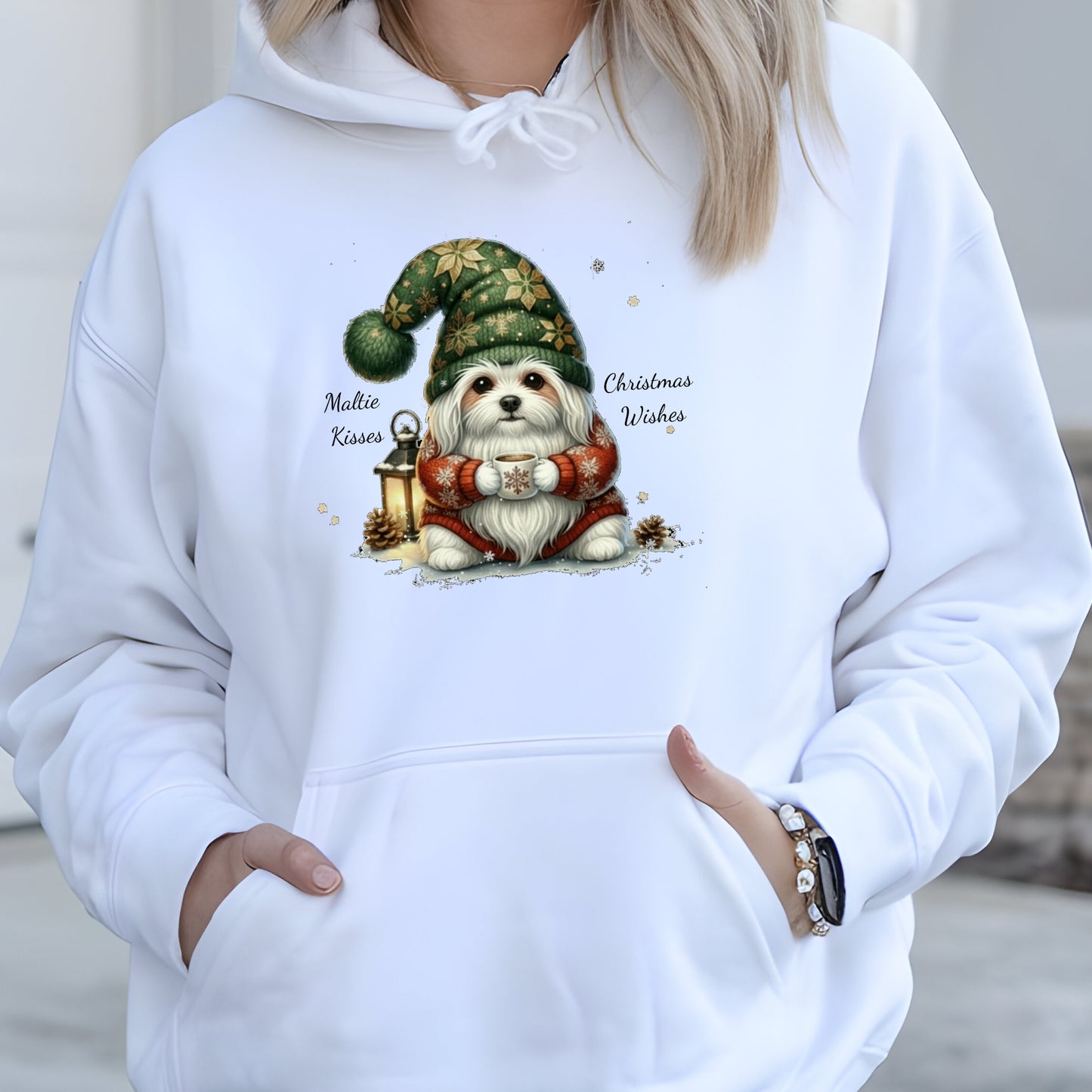 White hoodie with a Christmas-themed design of a dog wearing a gnome hat.