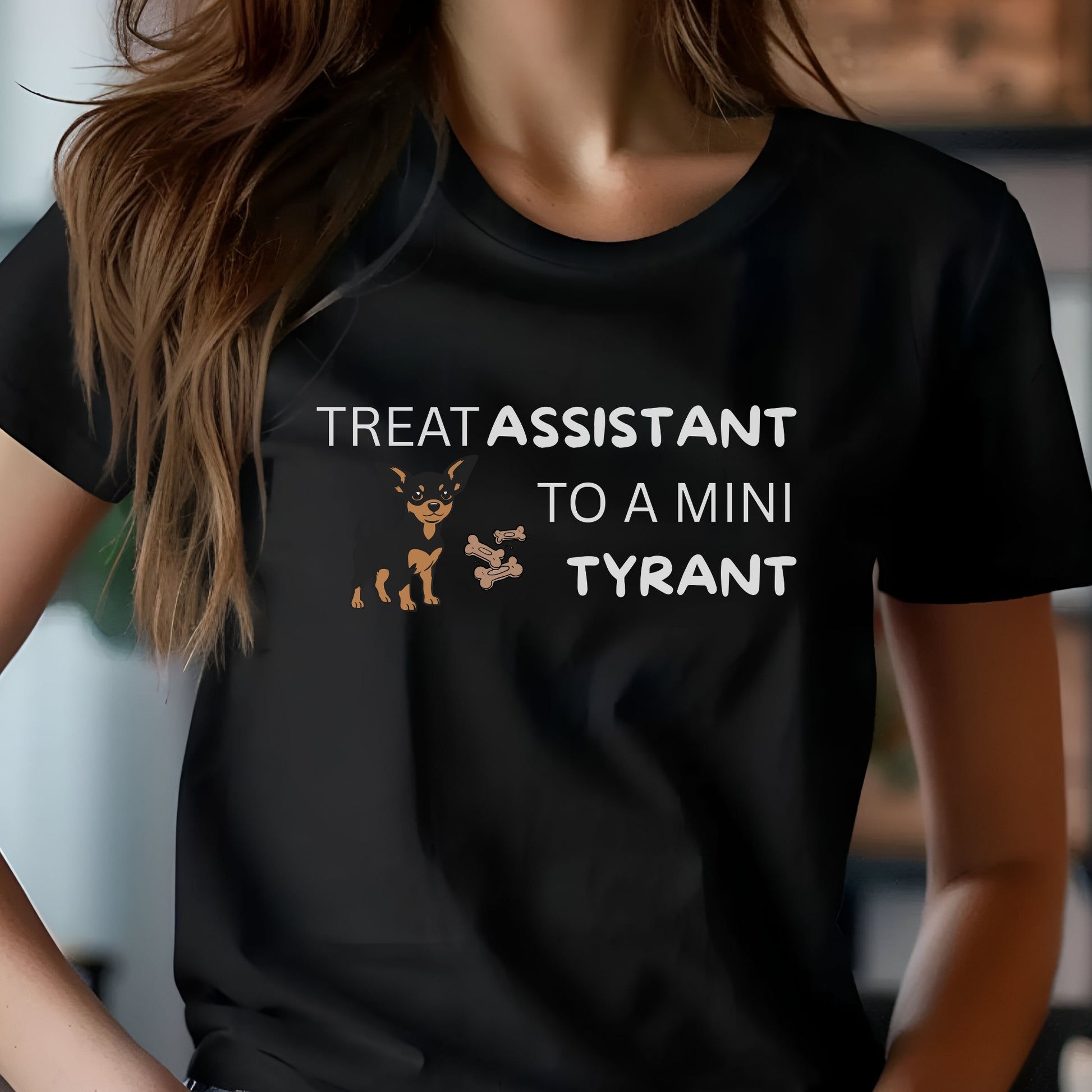 Black unisex t-shirt with Miniature Pinscher illustration and text: "Treat Assistant to a Mini Tyrant"