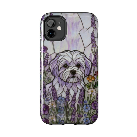 Phone case with a stylized dog illustration and floral design on a white background