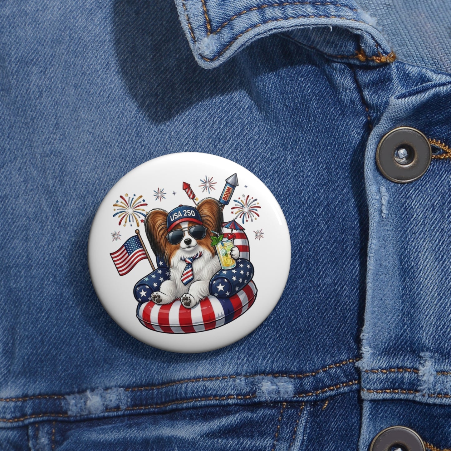 Button with a dog design featuring American flags and fireworks on a denim jacket.