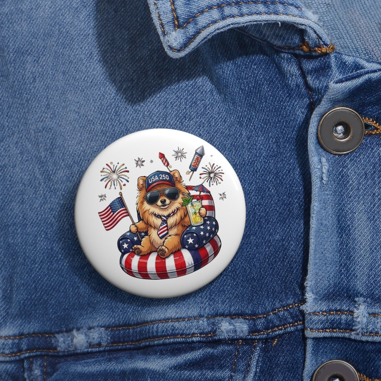 Button with a dog design featuring American flags and fireworks on a denim jacket.