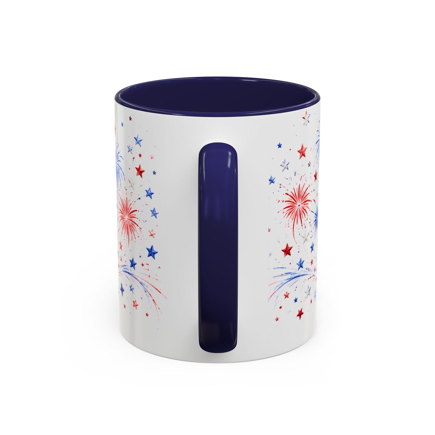 White mug with blue interior and handle, featuring red and blue star and firework designs on a white background.