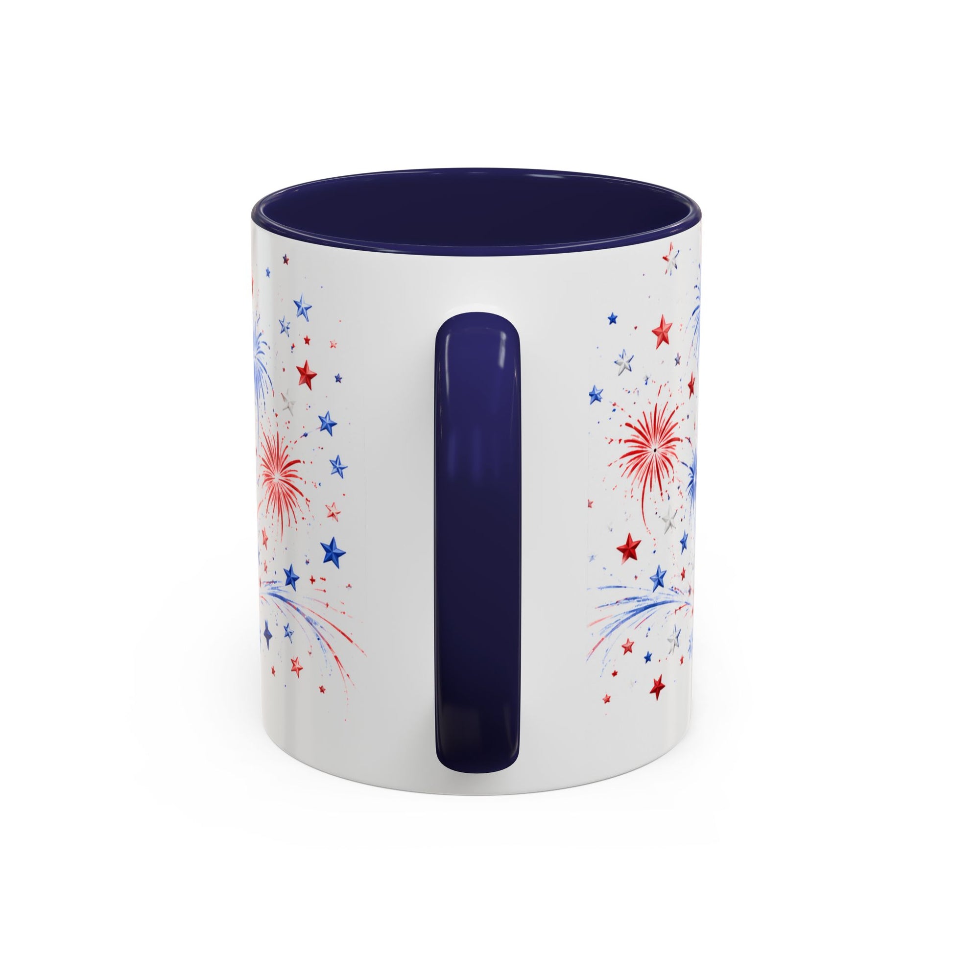 White mug with blue interior and handle, featuring red and blue star and firework designs on a white background.