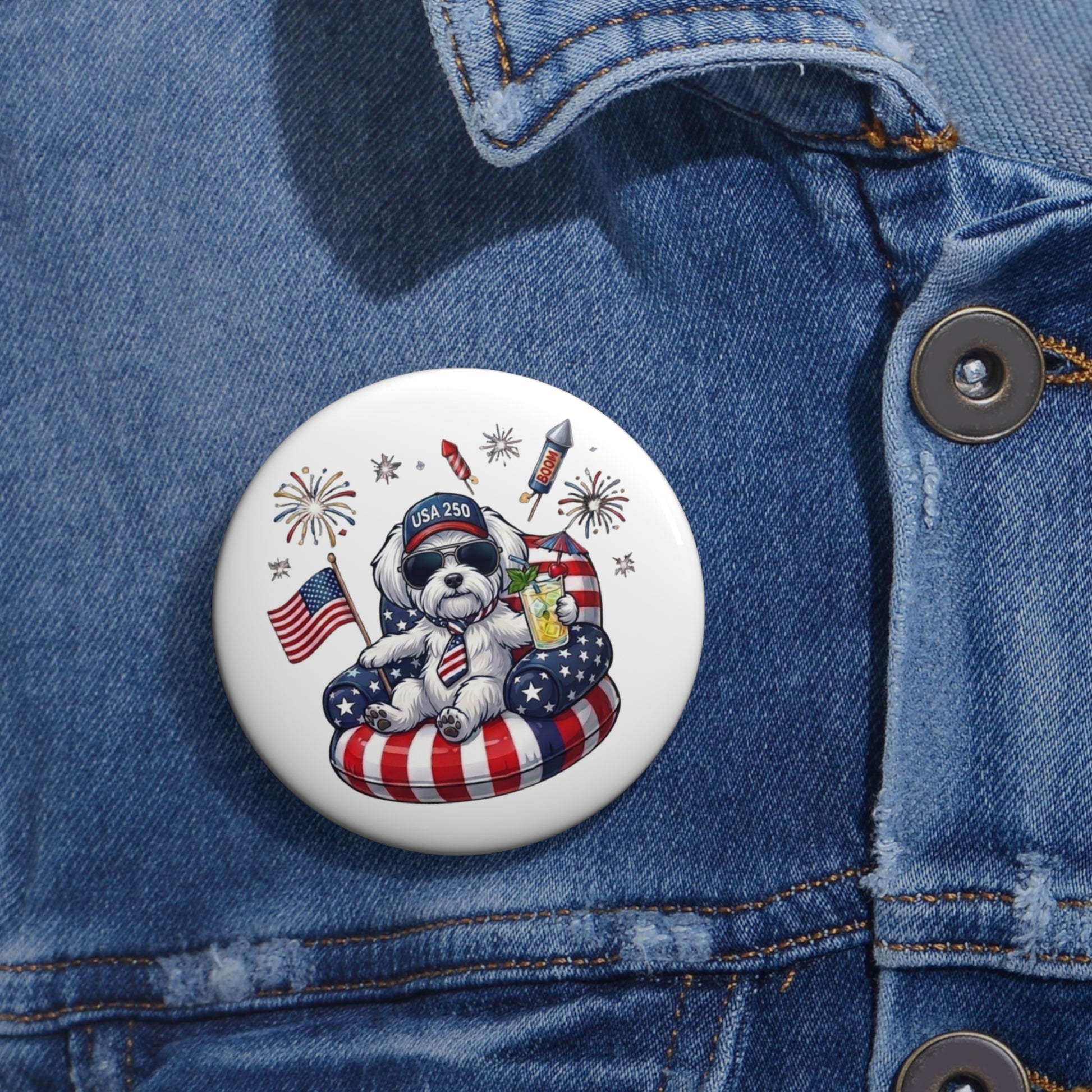 Button with a dog design featuring American flags and fireworks on a denim jacket.