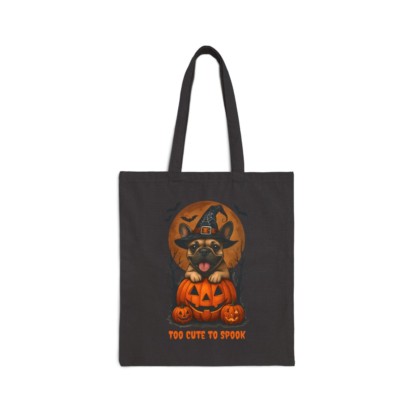 Black tote bag with Halloween-themed design of a dog in a pumpkin, on a white background.