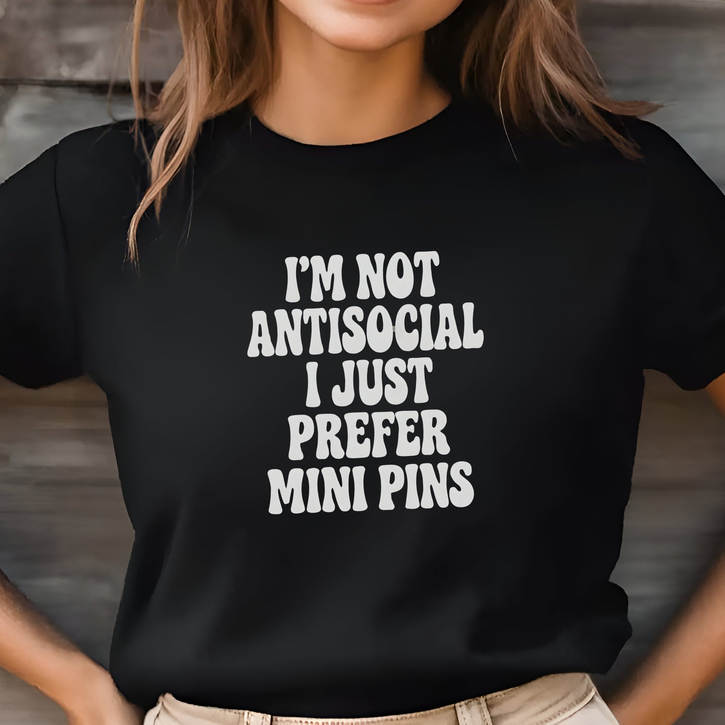 Woman wearing a black "I’m Not Antisocial, I Just Prefer Mini Pins" Miniature Pinscher unisex t-shirt
