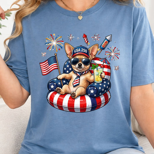 Person wearing a blue t-shirt with a dog graphic celebrating the 4th of July.