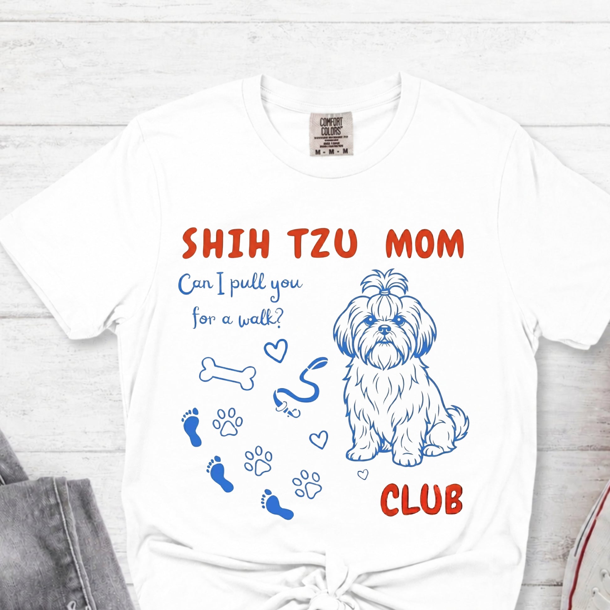 White t-shirt with Shih Tzu graphic and text on a white background
