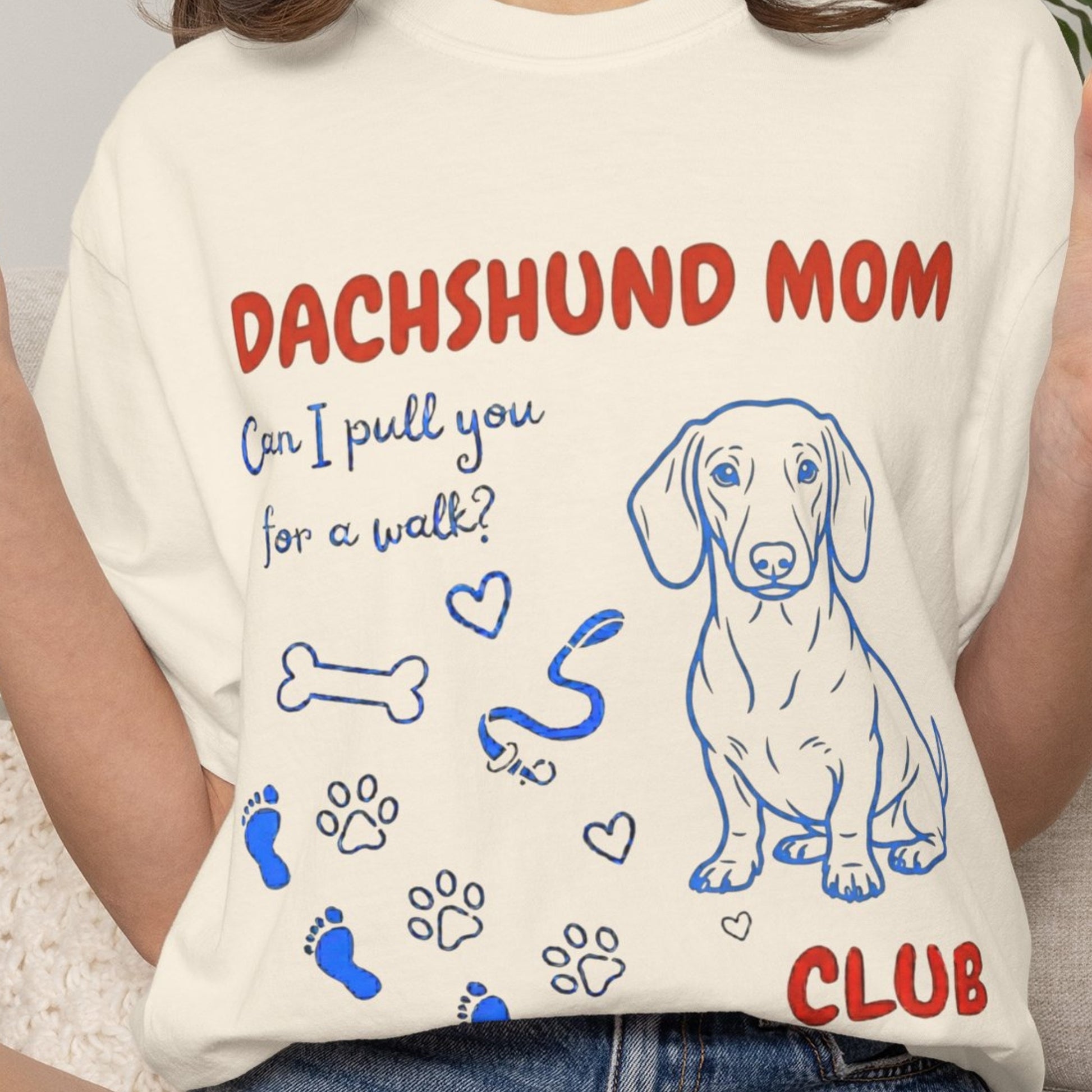 T-shirt with dachshund design and text on a plain background