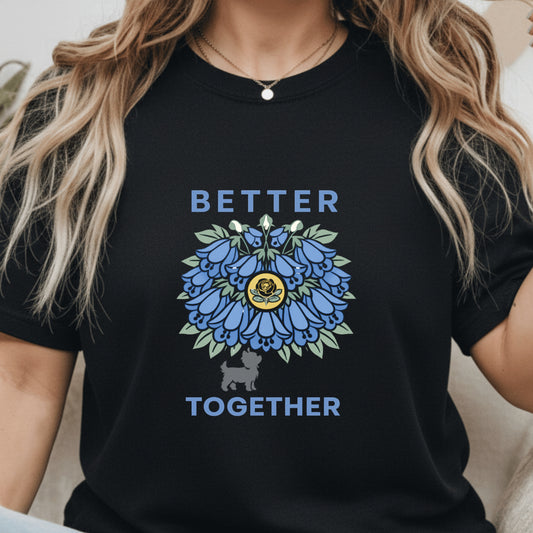 Person wearing a black t-shirt with a blue floral design and 'Better Together' text.