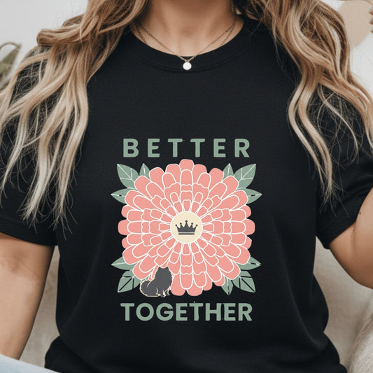 Person wearing a black t-shirt with a pink flower graphic and 'Better Together' text.
