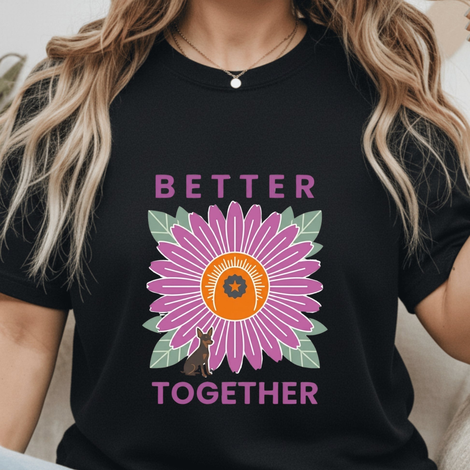 Person wearing a black t-shirt with a purple flower graphic and 'Better Together' text.