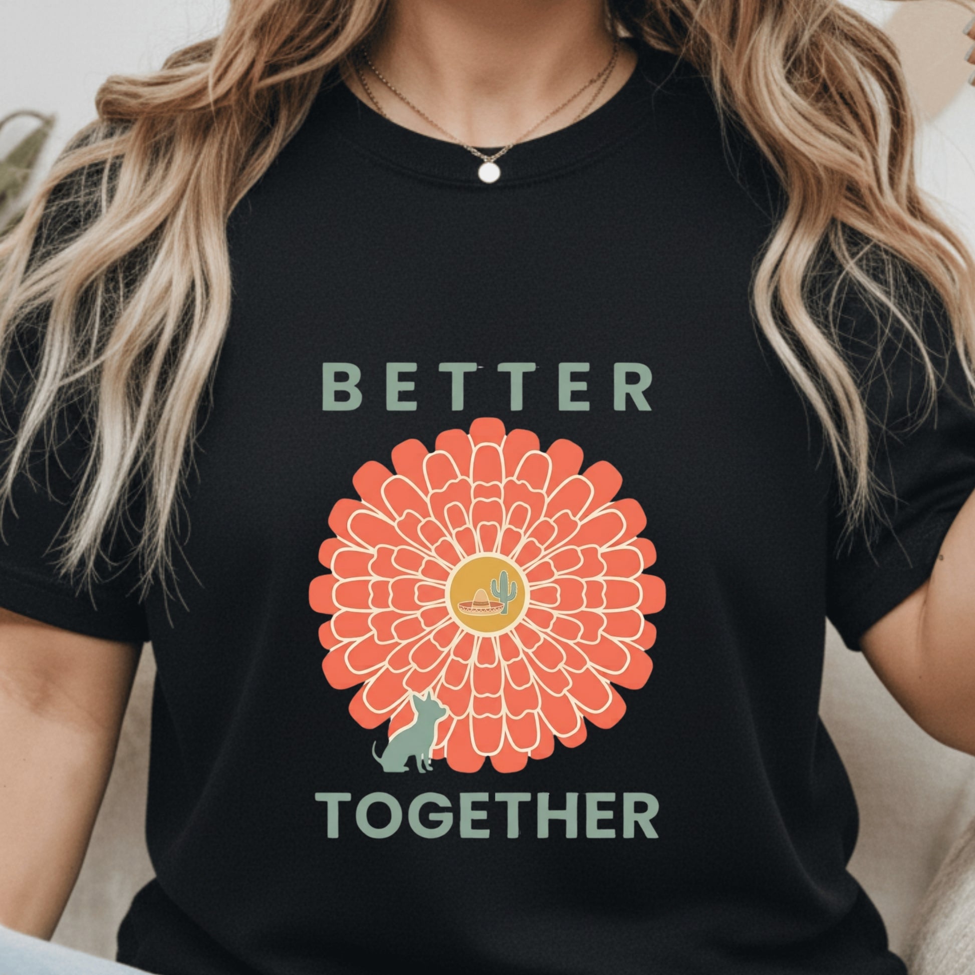 Person wearing a black t-shirt with a floral design and 'Better Together' text.