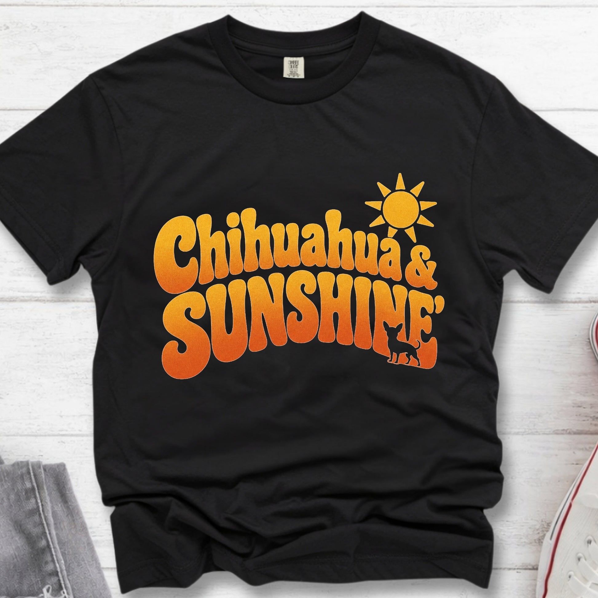 Chihuahua Sunshine retro black t-shirt flat lay mockup for dog moms with yellow colored text "Chihuahuas & Sunshine".