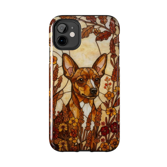 Phone case with a dog illustration surrounded by autumn leaves and flowers on a white background