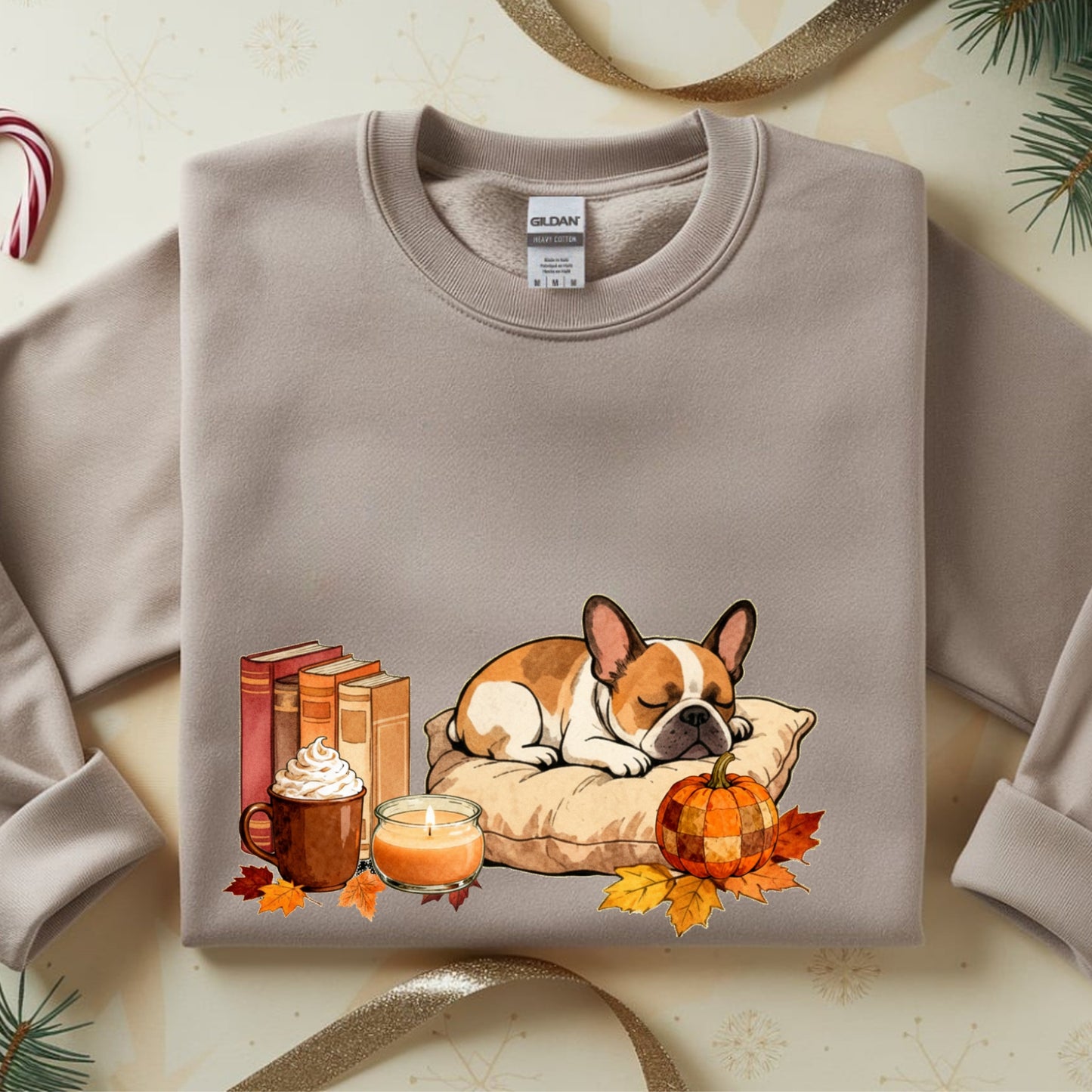 Gray sweatshirt with a dog, books, and pumpkin design on a light background