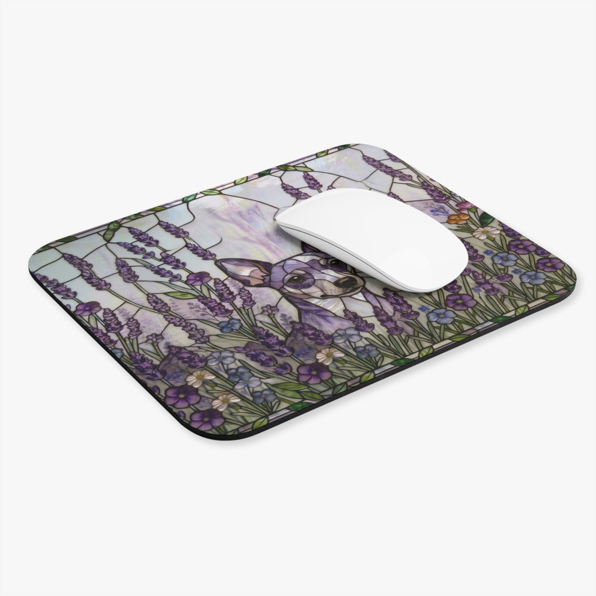 A rectangular computer mouse pad with rounded corners, featuring a printed design of a deer surrounded by purple lavender and blue flowers. A white computer mouse is placed on top of the pad.