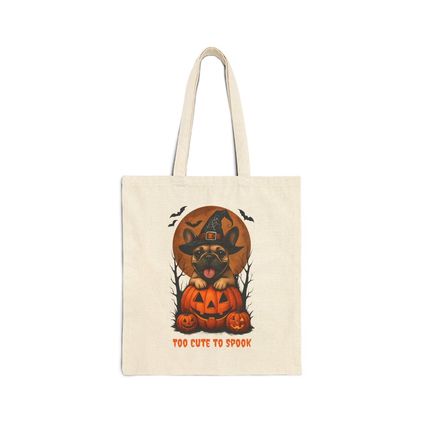 Tote bag with Halloween design of a dog in a pumpkin and witch hat, text 'Too Cute to Spook', on a white background.
