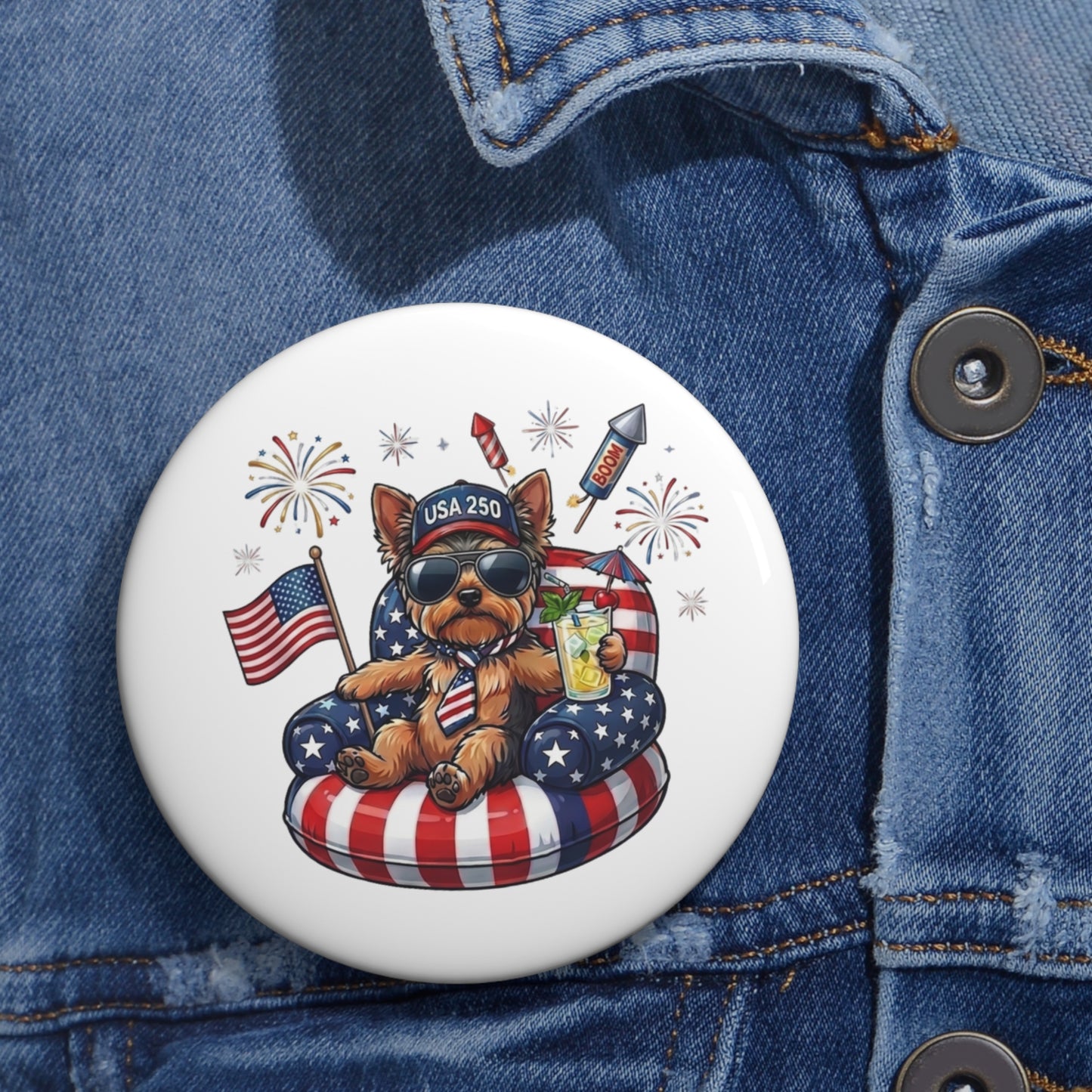 Button with a dog design featuring American flags and fireworks on a denim jacket.