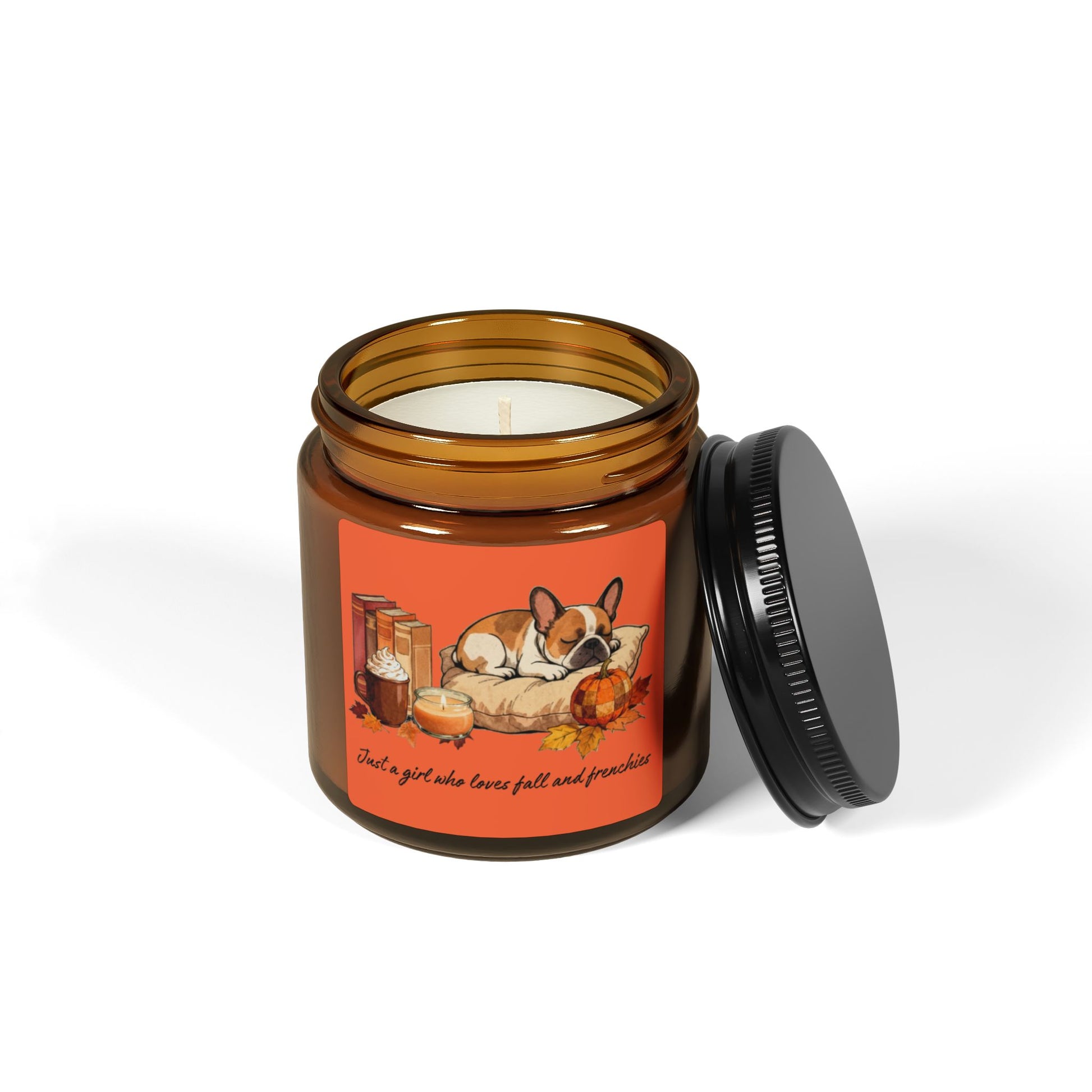 Candle in an amber jar with a decorative label featuring a dog illustration on a white background
