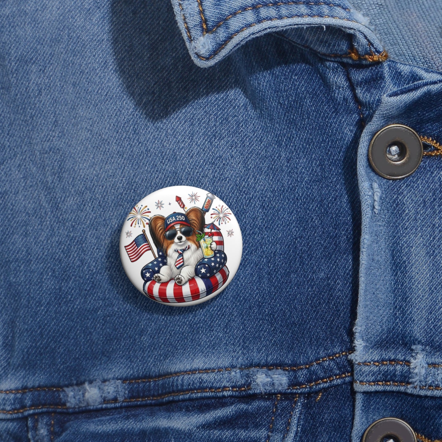 Button with a dog wearing a patriotic outfit on a blue denim jacket.