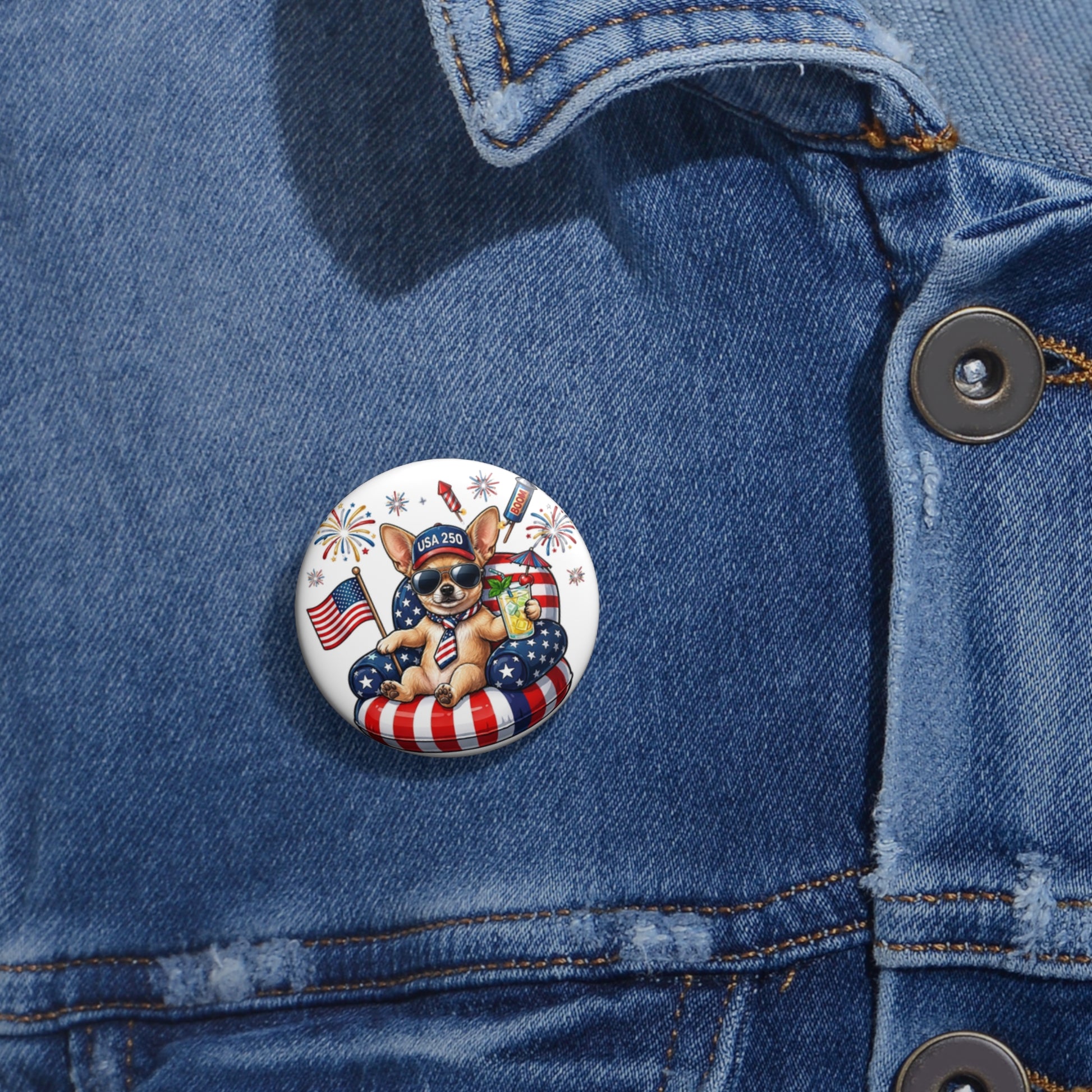 Button with a dog wearing a hat and American flag design on a denim jacket.