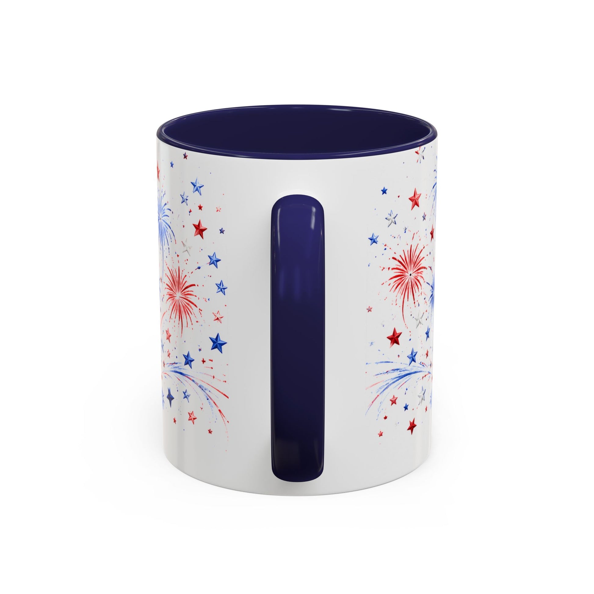 White mug with blue interior and handle, featuring red and blue star and firework designs on a white background.