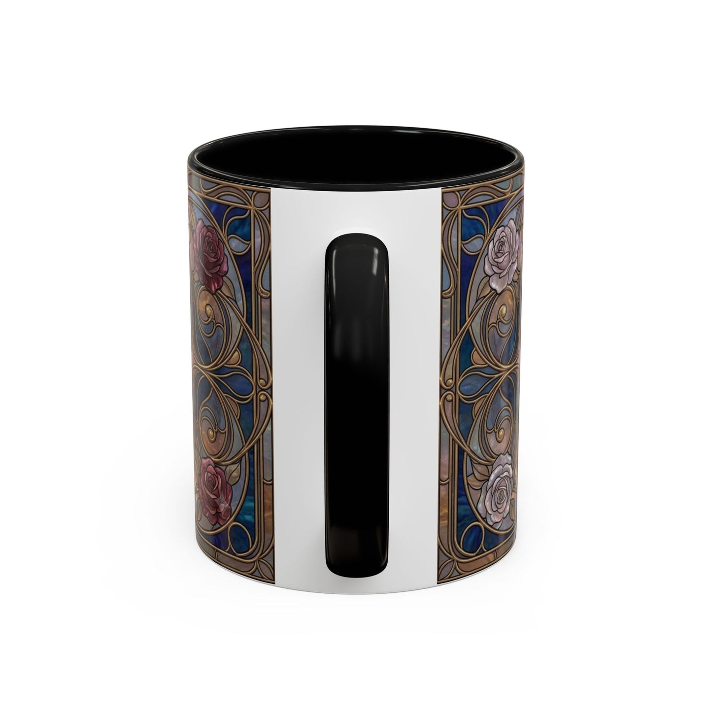 A ceramic mug with a black handle and interior, featuring a decorative Art Nouveau style pattern with blue, gold, pink, and white floral details on a white exterior.
