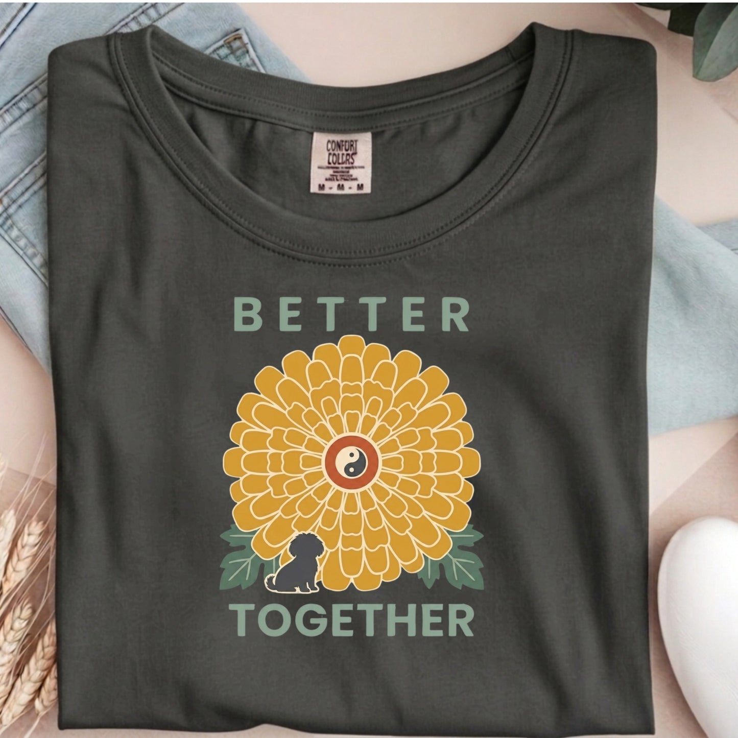 Dark gray t-shirt with a sunflower graphic and 'Better Together' text on a person wearing it.