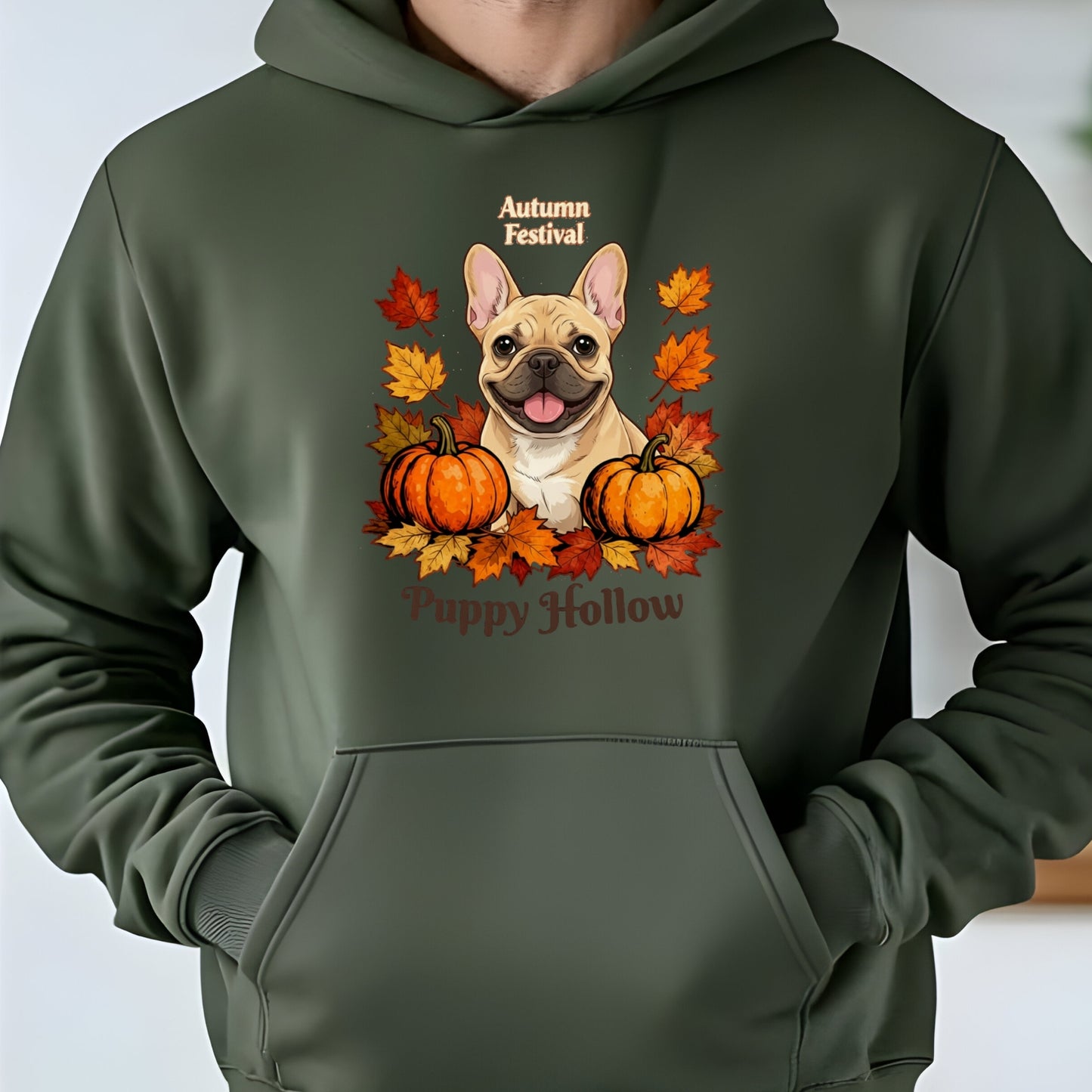 Green hoodie with a dog and autumn-themed design on a plain background