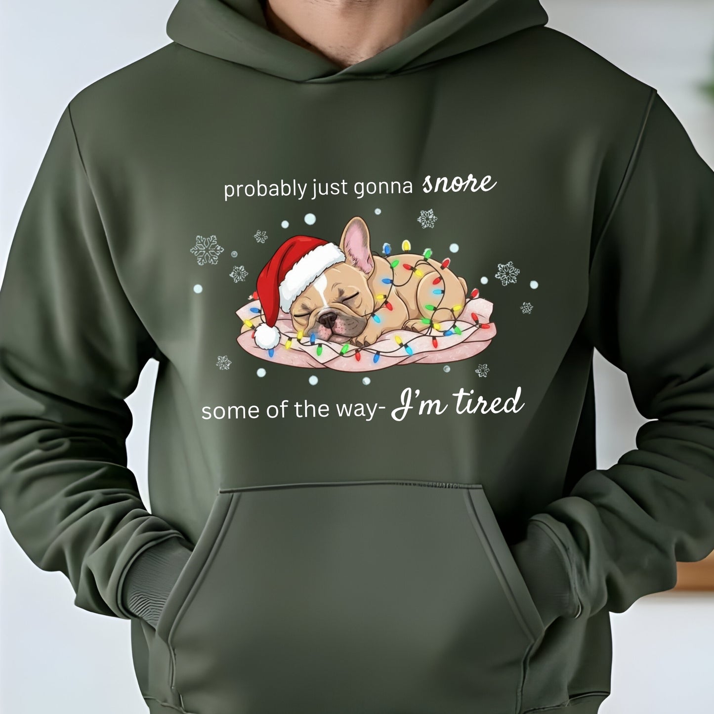 Green hoodie with a Christmas-themed design of a dog and text on a white background