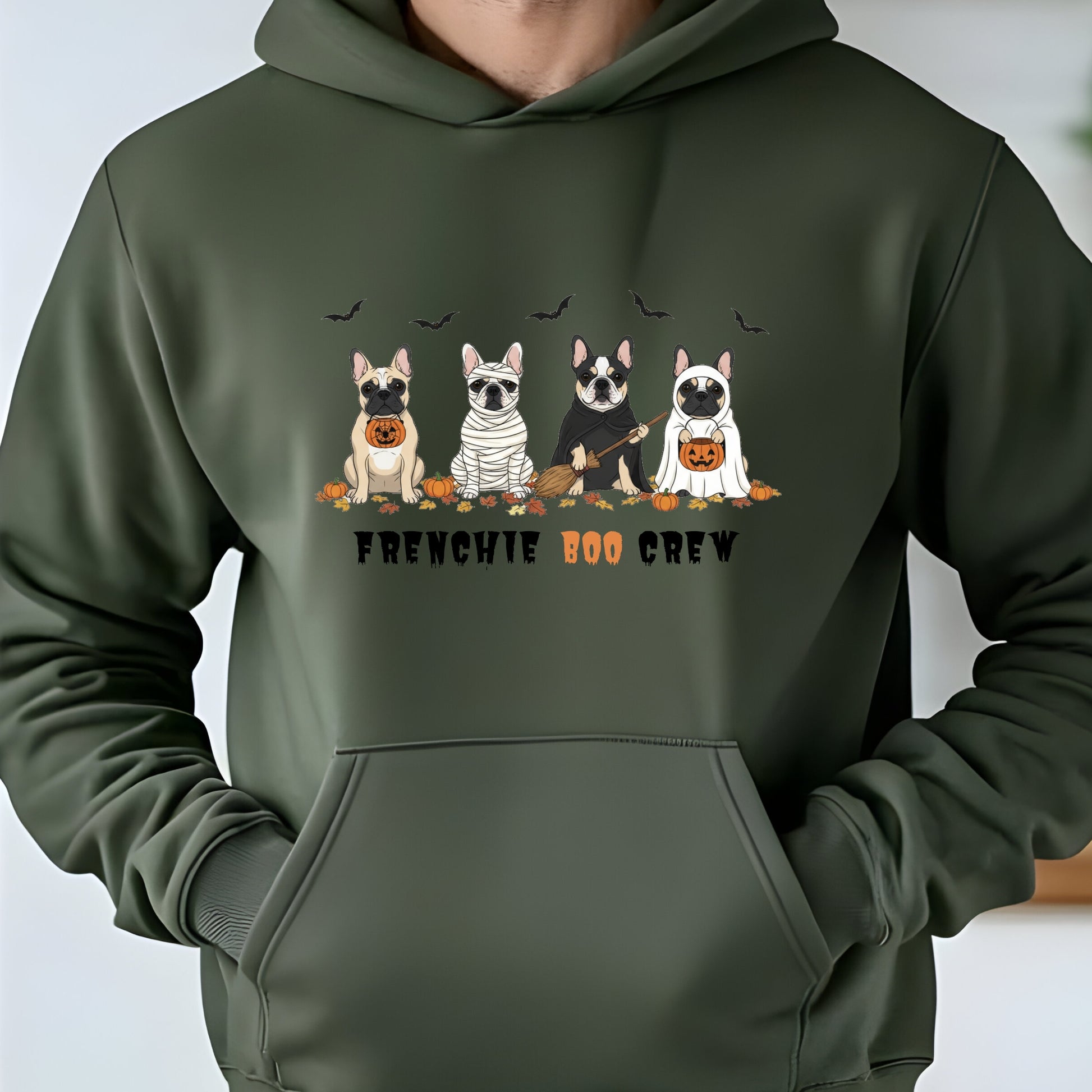 Halloween hoodie with four cartoon French Bulldogs in costumes, bats and pumpkins, and “Frenchie Boo Crew” text on white fabric.