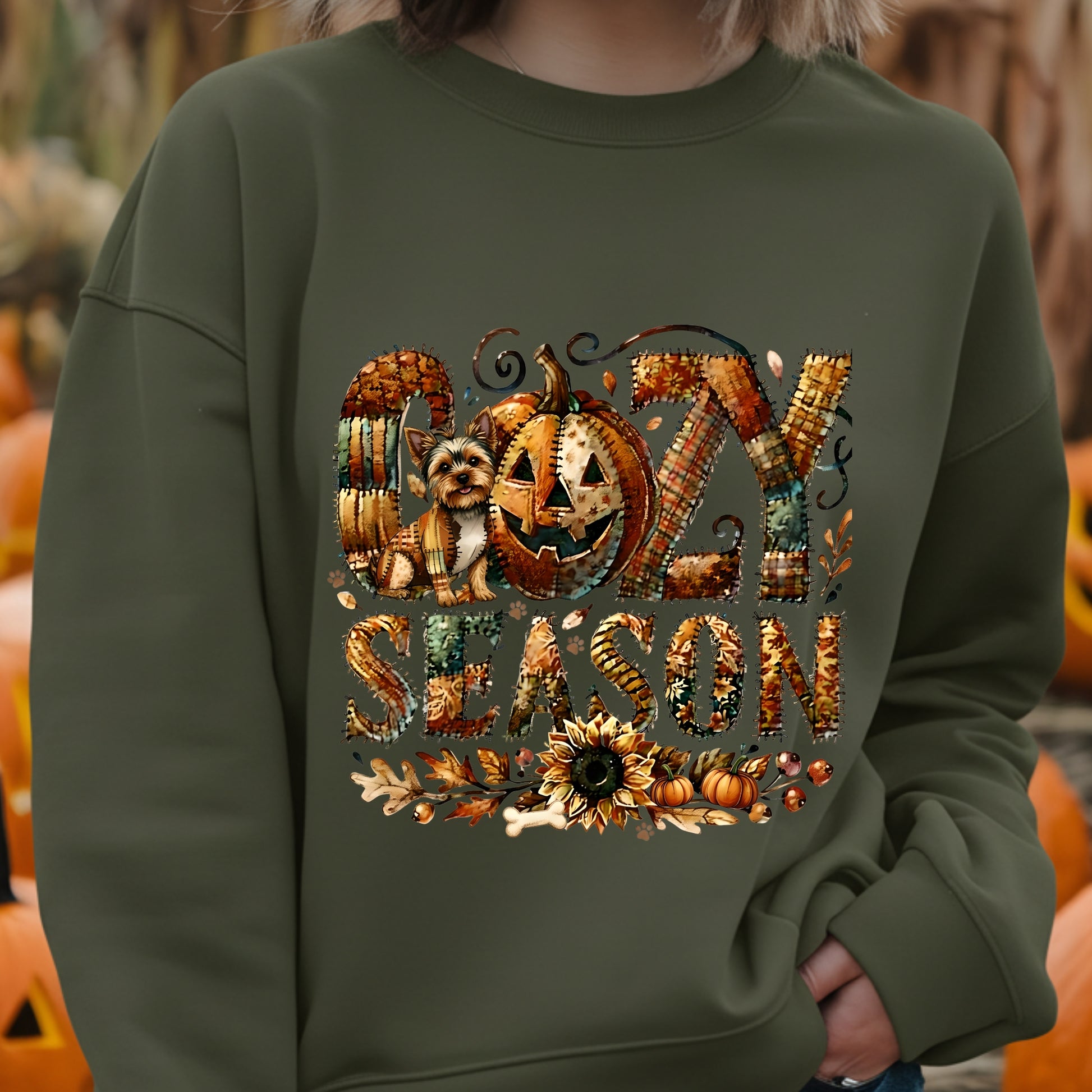 Green sweatshirt with 'Halloween Season' design featuring pumpkins and a dog.