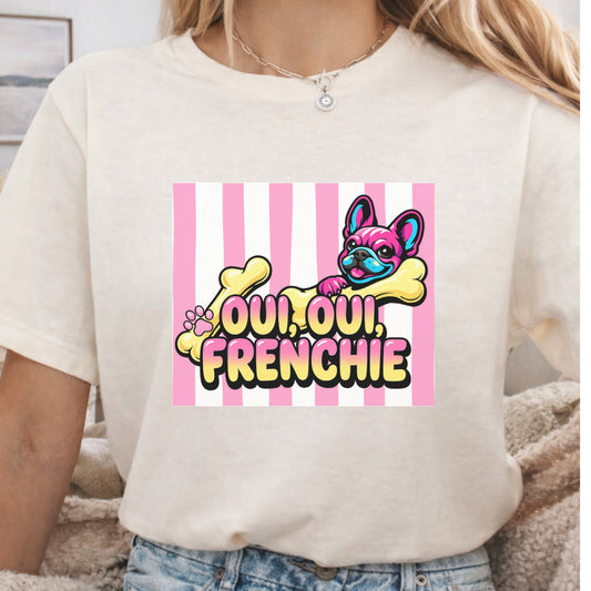 Beige t-shirt with a colorful graphic of a dog and text on a striped background
