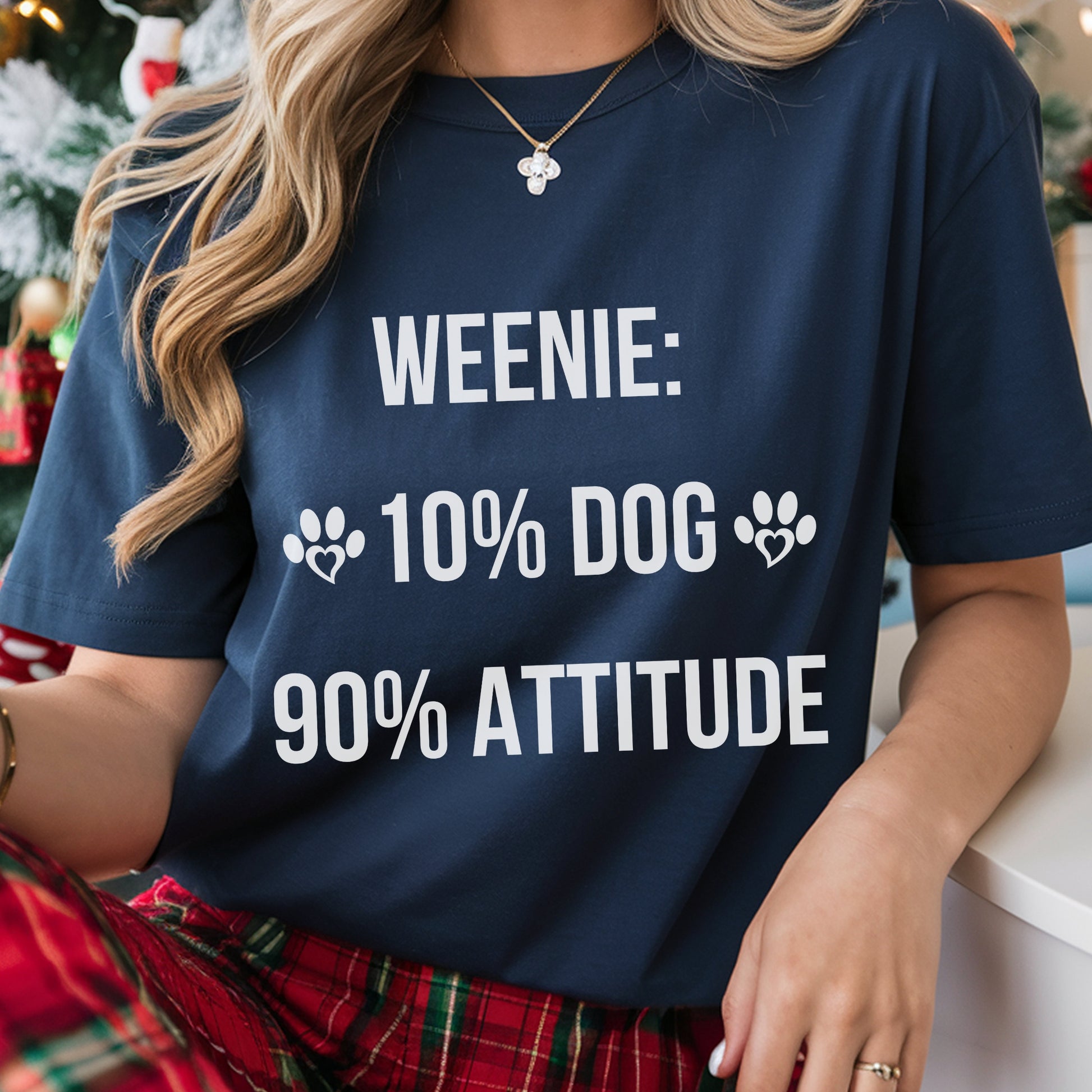 Person wearing a navy blue t-shirt with humorous text design.