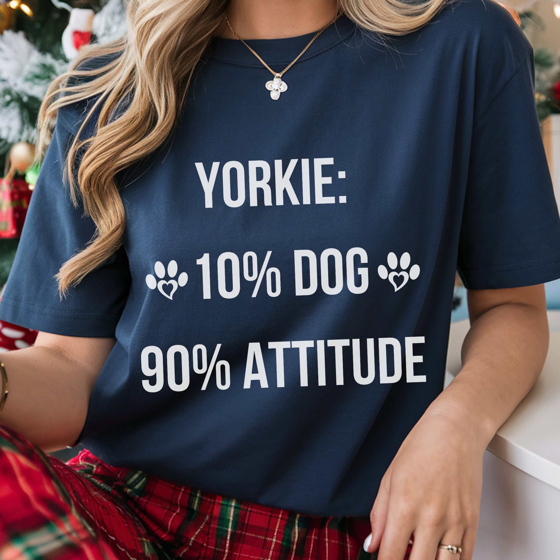 Person wearing a navy blue t-shirt with a humorous dog quote design.